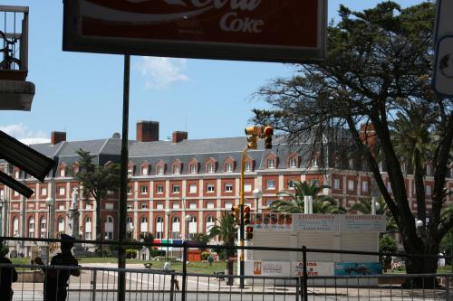 a large building in front of a street at Hotel Vip´s in Mar del Plata