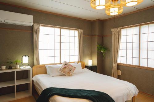 Una cama o camas en una habitación de Butter Hotel
