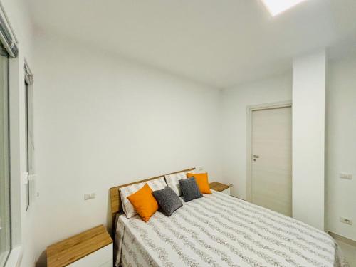 Cama o camas de una habitación en Soverato Apartments