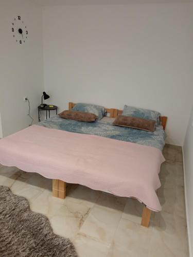 Postel nebo postele na pokoji v ubytování Tića