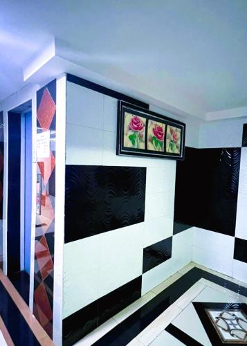 Una televisión o centro de entretenimiento en ARK Wave Hotel Ampang