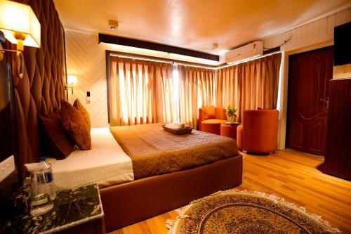 Voodi või voodid majutusasutuse Walisons Peace Resort toas