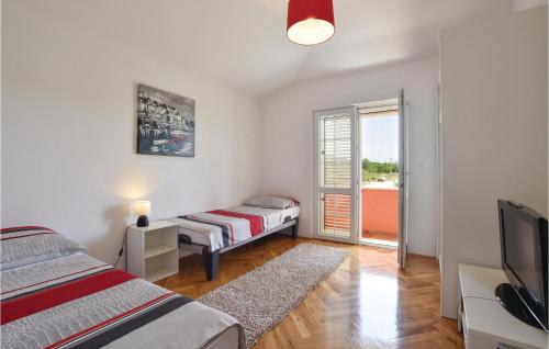 Postel nebo postele na pokoji v ubytování Four-Bedroom Holiday Home In Dicmo