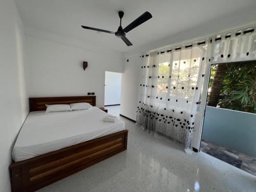 Postel nebo postele na pokoji v ubytování Nio Lit