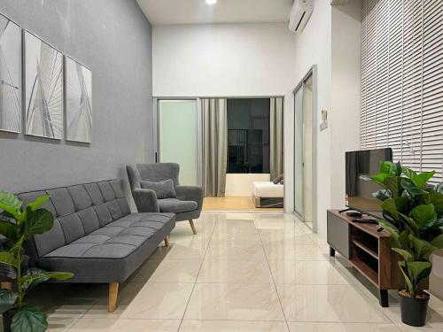 Ruang duduk di Hush Inn at ITCC Manhattan Suites