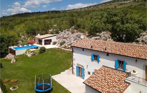 an aerial view of a house with a yard at Villa Elia in Nova Vas