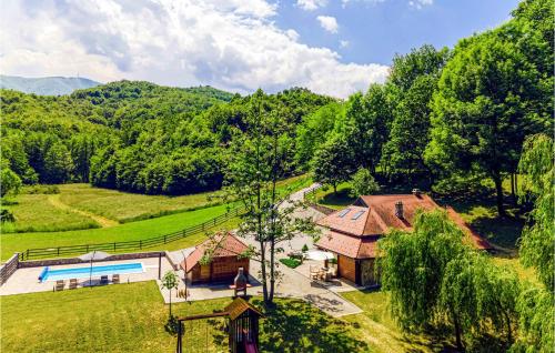 an aerial view of a farm with a house and a pool at Cozy Home In Vitesinec With Sauna in Salinovec