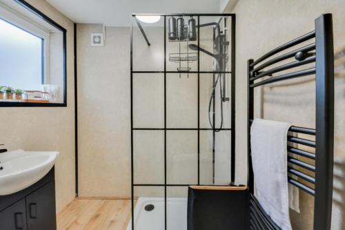a bathroom with a shower and a sink at Ripon By Serene Stays Stylish Liverpool Home Sleeps 5 with Free Parking Fast WiFi and Close to Stadiums in Liverpool