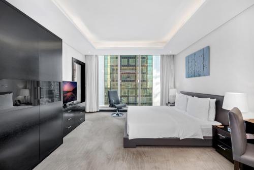 Televisyen dan/atau pusat hiburan di Kempinski Residences & Suites, Doha