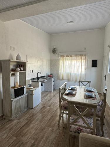 A kitchen or kitchenette at Mercedes Centro Apartamentos Uruguay