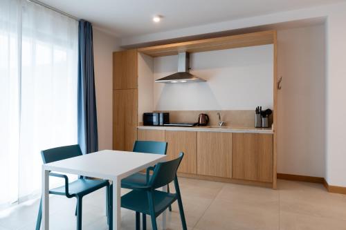Η κουζίνα ή μικρή κουζίνα στο Hotel Delfino