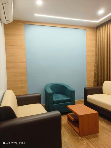 Χώρος καθιστικού στο RS Regal Inn-Deoghar