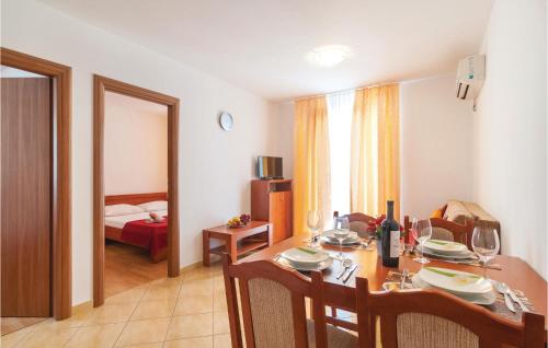 Postel nebo postele na pokoji v ubytování Apartment Supetar 43