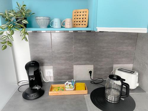 un modèle de cuisine avec comptoir dans l'établissement L'Écureuil, à Calais