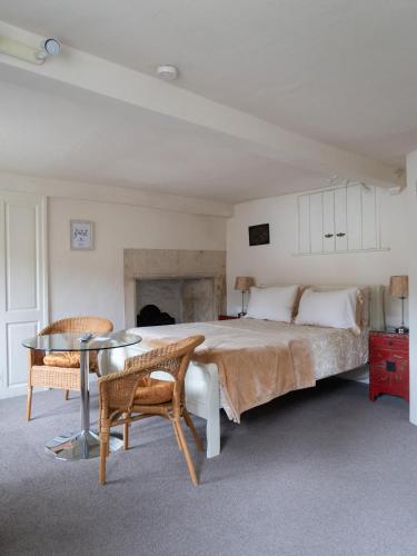 Ένα ή περισσότερα κρεβάτια σε δωμάτιο στο Longbridge House