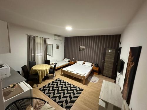 Postel nebo postele na pokoji v ubytování Apartments Agape