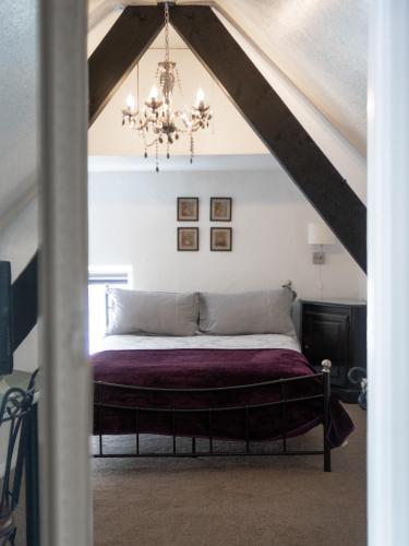 Ένα ή περισσότερα κρεβάτια σε δωμάτιο στο Longbridge House