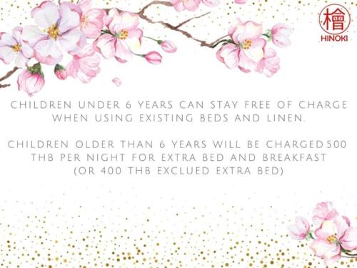 a branch of cherry blossoms on a white background at Hinoki Hotel - ONSEN Chiang Mai in Chiang Mai