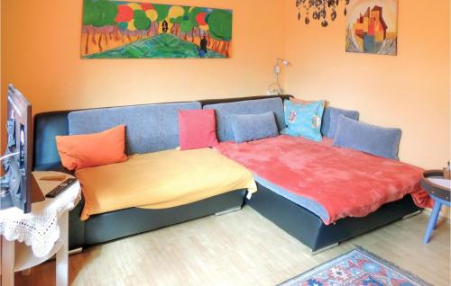 Кровать или кровати в номере Attraktives Ferienhaus Tulfes
