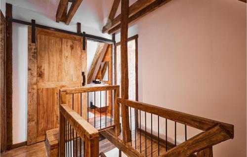a wooden staircase in a house with wooden beams at Gorgeous Home In Popovaca With Wifi in Popovača
