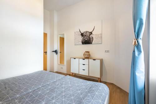 Ένα ή περισσότερα κρεβάτια σε δωμάτιο στο Zentrumsnahe Wohnung