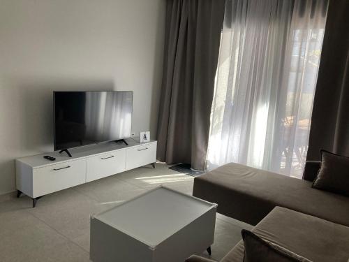 Et tv og/eller underholdning på Artion Cozy Residence Nikiti