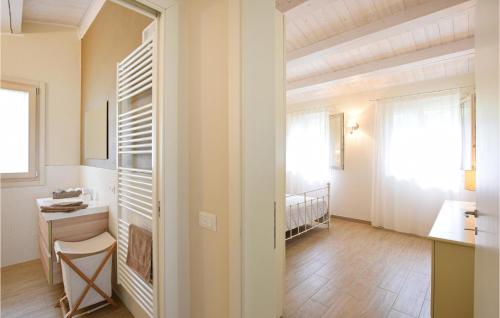 a small room with a desk and a window at 2 Bedroom Gorgeous Home In Vò Euganeo in Boccon
