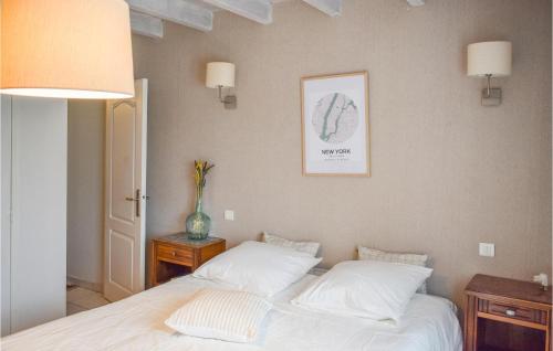 a bedroom with a bed with two white pillows at Stunning Home In Beraut With Wifi in Béraut