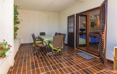 Patio alebo iná vonkajšia časť ubytovania Holiday Home V,ulica,Br, I