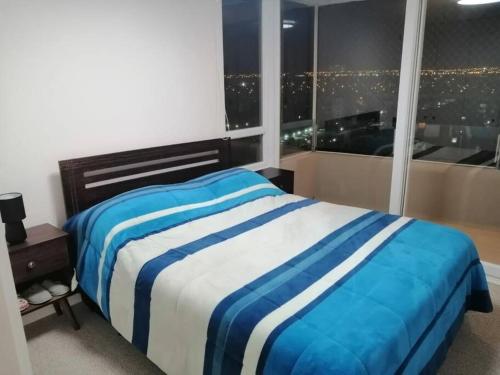 Ένα ή περισσότερα κρεβάτια σε δωμάτιο στο Departamento IV región