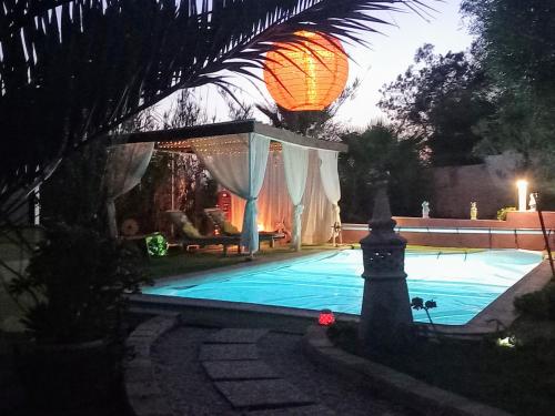 Bazén v ubytování ROMANCE Valdareina, Piscine chauffée, Bénagil-Carvoeiro nebo v jeho okolí