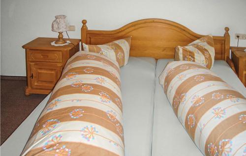 Attraktive Ferienwohnung Ehrw,にあるベッド