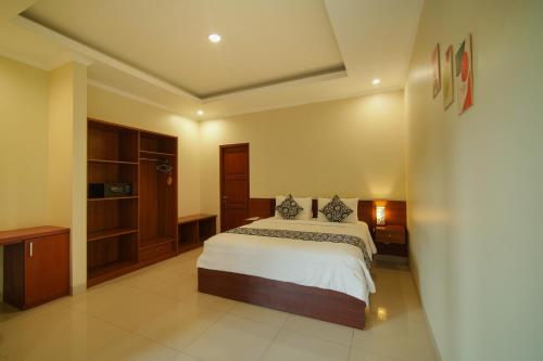Katil atau katil-katil dalam bilik di Canggu Bagus Guest House