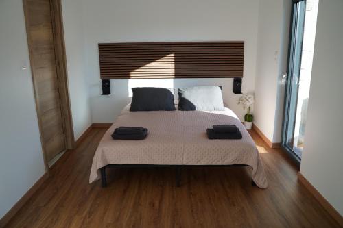 Postel nebo postele na pokoji v ubytování Tiny House Turckheim