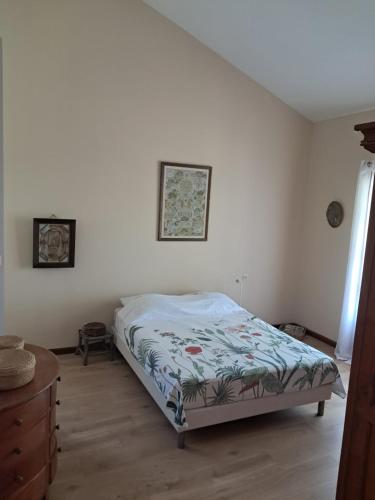 Postel nebo postele na pokoji v ubytování Maison de charme à Manapany
