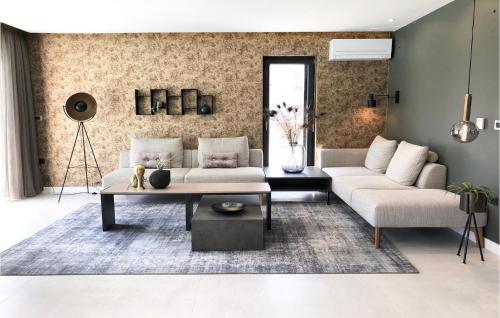 a living room with a couch and a table at Villa Bonaca in Medulin