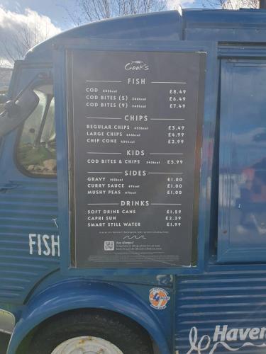 a menu on the side of a food truck at Barbara's Caravan Craig Tara in Ayr