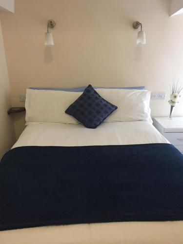 Кровать или кровати в номере Marlow Lodge