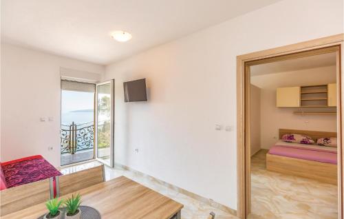 Postel nebo postele na pokoji v ubytování One-Bedroom Apartment In Krvavica