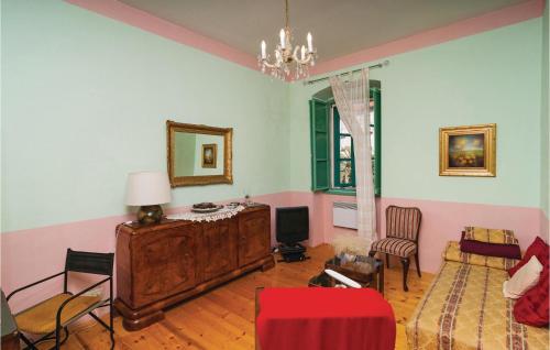 a living room with a couch and a table at Holiday Home Milna I in Milna