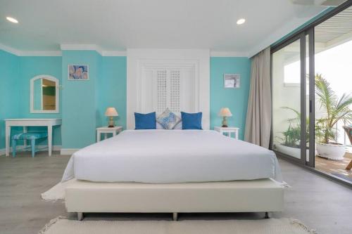 Ένα ή περισσότερα κρεβάτια σε δωμάτιο στο Waterfront High Tide Suite - Ocean View