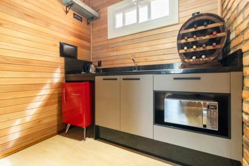 Dapur atau dapur kecil di Cabanas Ouro do Vale - Nascer do Sol
