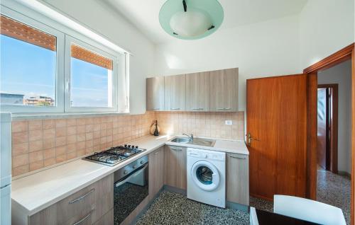 Kuchyň nebo kuchyňský kout v ubytování Il Porto