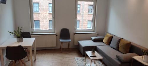 Posezení v ubytování Zentrales, gemütliches WG-Zimmer