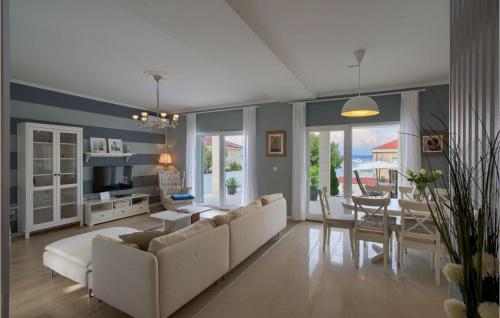 a living room with a couch and a table at Villa Tatijana in Zadar