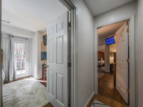 a hallway with a door leading to a bedroom at NEW LISTING Sasquatch Lodge F in Gatlinburg
