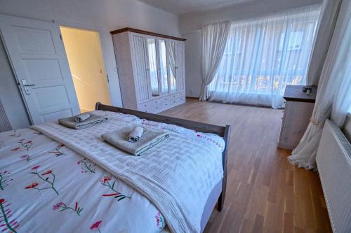 Katil atau katil-katil dalam bilik di Villa Veleslavín