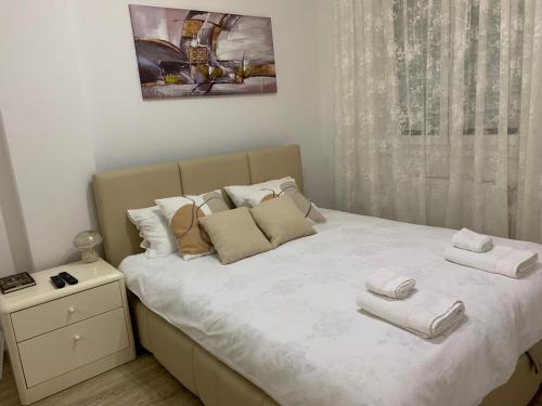 Postel nebo postele na pokoji v ubytování Knebl Apartman