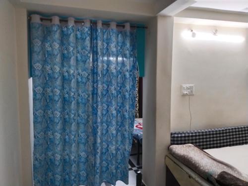 Postel nebo postele na pokoji v ubytování Nath Homestay