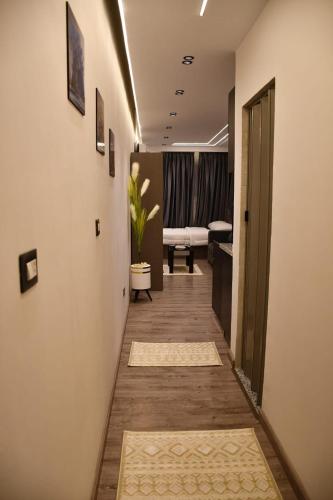 a corridor of an office with a corridorngthngthngthngthngthngthngthngth at ستوديو سكني 3 حديث مجهز بالكامل in Cairo